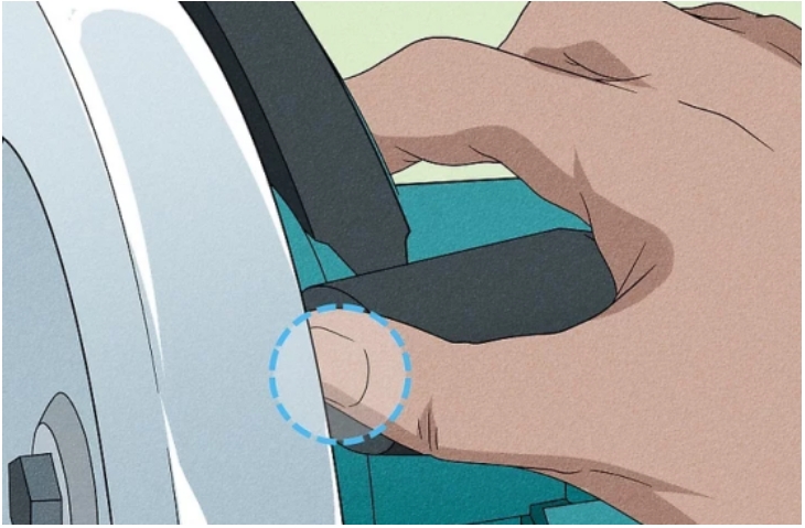 Hold down the spindle-lock button