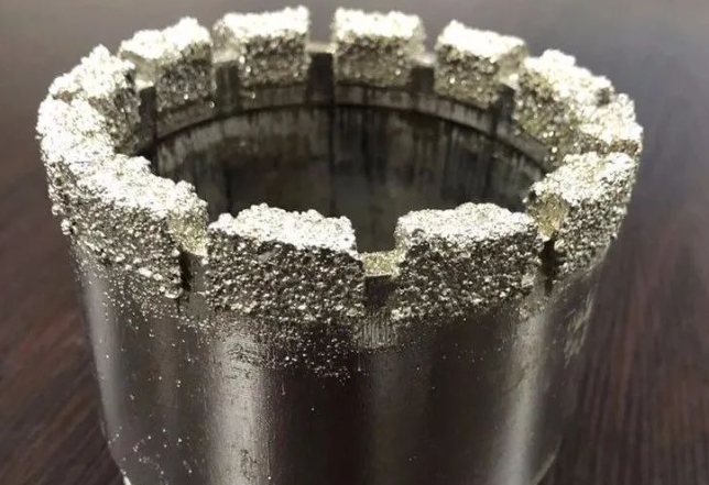 Burning out of diamond core drill bit