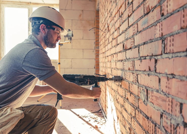 Installing air conditioning pipes with SDS core drill bits