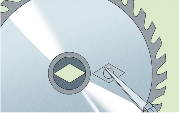 Remove the diamond insert from the center of the new blade